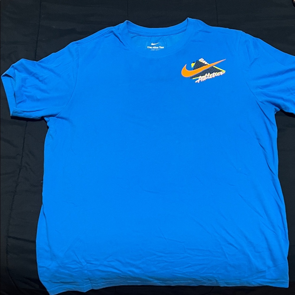 Nike Men's Bright Blue Tee with Orange Logo